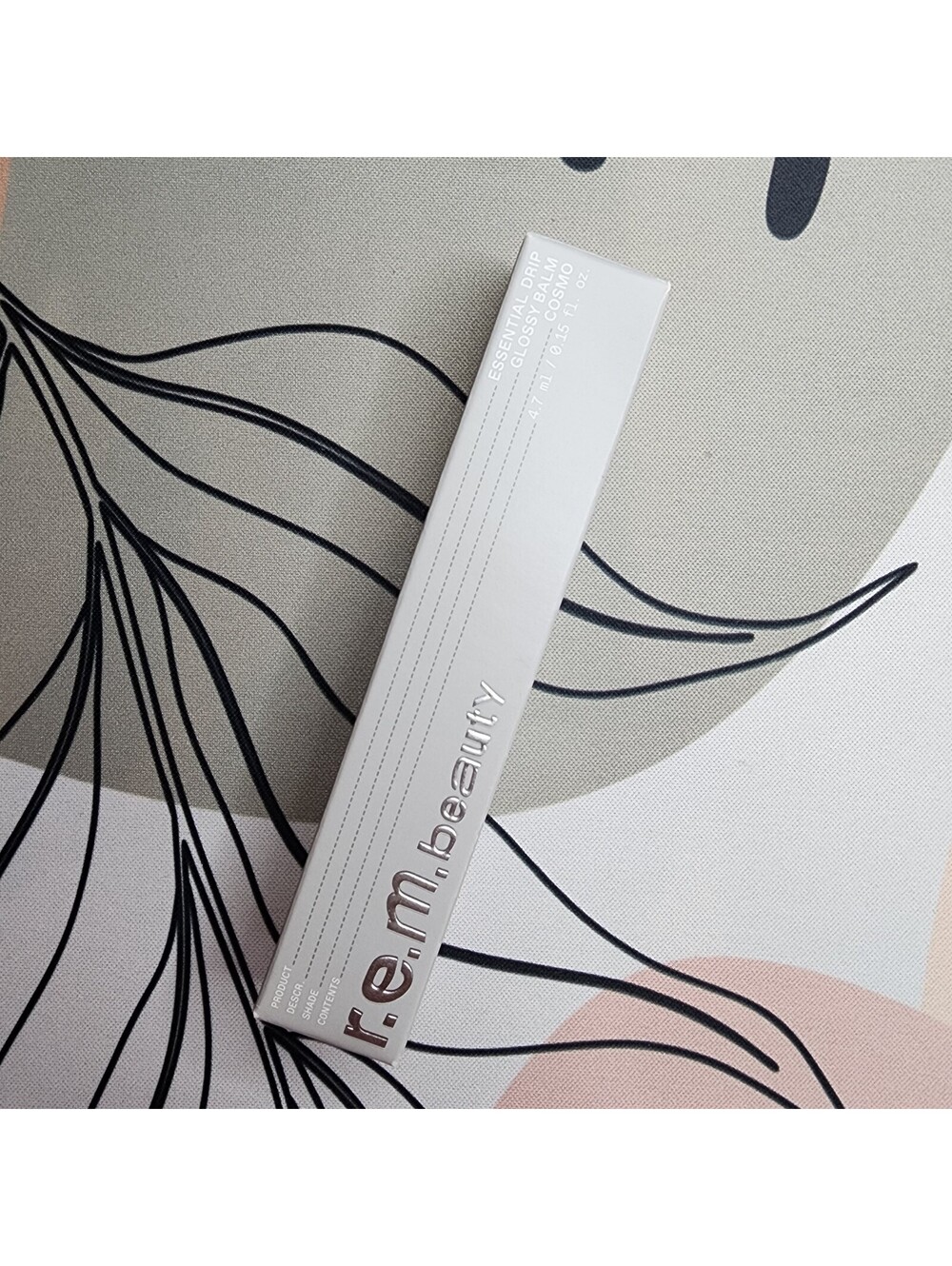 r.e.m. beauty Essential Drip Lip Gloss in Cosmo - Light Pink